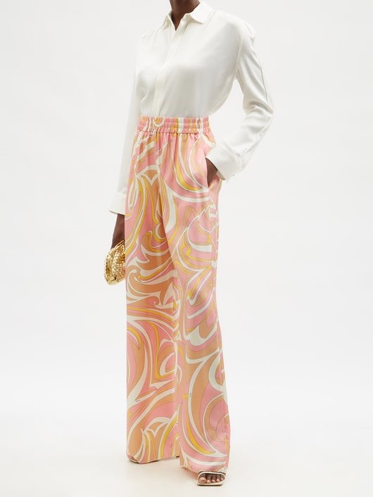 a women dummy wear a shirt and printed trouser